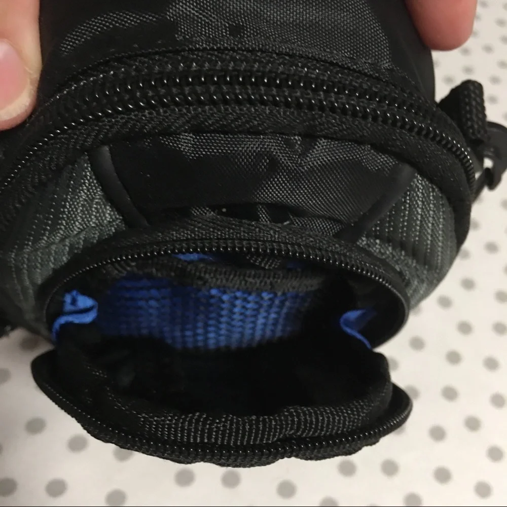 Case Logic Small black camera case with shoulder strap.